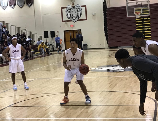 Palm Beach Lakes senior forward Giancarlo Rosado (1), pictured shooting a free throw in Friday night’s loss to Dwyer, dropped 45 pounds since his junior season and signed to play college basketball at Florida Atlantic. [CHRIS NELSEN/SPECIAL TO THE POST]