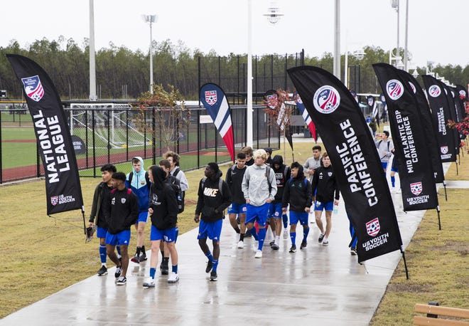 Sparta United of Utah exits the field during the United States Youth Soccer National League Showcase in Panama City Beach on Wednesday. The showcase featured teams from across the nation. [JOSHUA BOUCHER/THE NEWS HERALD]