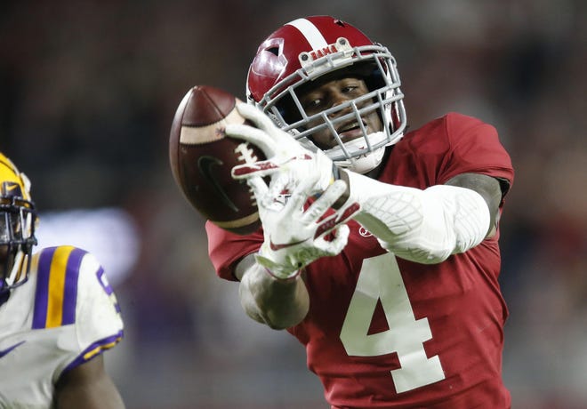 A would-be touchdown pass slips through the grasp of Alabama wide receiver Jerry Jeudy (4) during LSU's 46-41 win over Alabama Saturday, Nov. 9, 2019. [Staff Photo/Gary Cosby Jr.]
