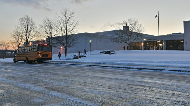 The north entrance to Fairview High School in Fairview Township is shown at sunrise on Wednesday. District officials are planning a $50 million expansion and renovation of the school. [CHRISTOPHER MILLETTE/ERIE TIMES-NEWS]
