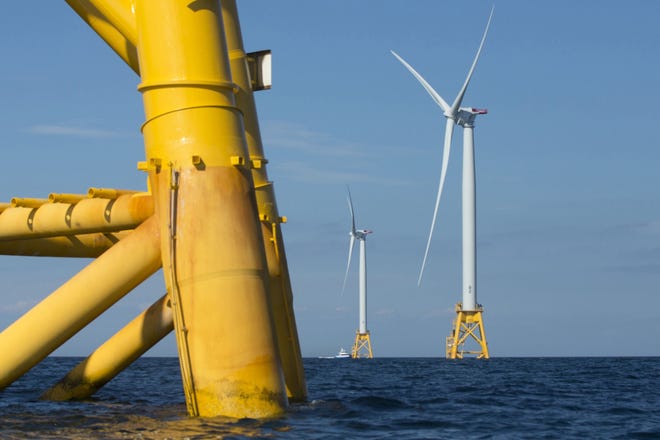 Wind turbines from the Deepwater Wind project are seen in the sea off Block Island, R.I., in 2016. The federal government held a meeting Thursday, Dec. 12, 2019, at the University of New Hampshire in Durham, N.H., to discuss the potential for offshore wind in the Gulf of Maine. [AP photo/Michael Dwyer, file]