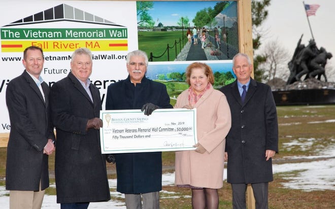 Joe Marshall (center), President of the Vietnam Veterans Memorial Wall Committee, receives the $50,000 grant from (left to right) Jeff Bradley, Vice President/Community Relations, Bristol County Savings Bank; Patrick Murray, President & CEO, Bristol County Savings Bank; Joan Medeiros, Vice President/Commercial Lending, Bristol County Savings Bank; and Roger Cabral, Senior Vice President/Commercial Lending, Bristol County Savings Bank. [Submitted photo]