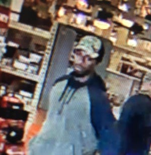 Surveillance footage of the Home Depot shoplifting suspect. [Photo courtesy of SPD]