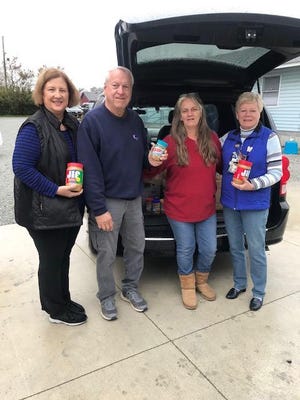 The Tryon Civitan Club recently delivered 359 jars of peanut butter and 68 jars of jelly to Religious Community Services. This was the result of their community wide drive during the month of October which they have been doing for 12 years. Pictured left to right are Tryon Civitans Janet and Ralph Routier, Jeanette Pawelszyk, RCS warehouse supervisor and Tryon Civitan Rita MacIndoe. [CONTRIBUTED PHOTO]