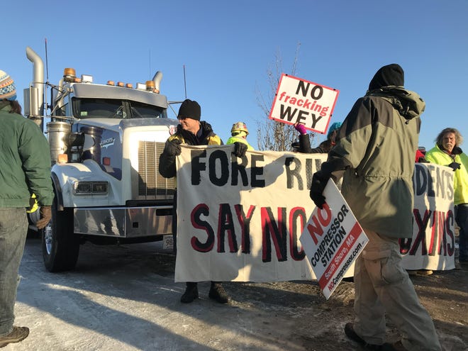 Protesters at the gas compressor station construction site in Weymouth. [Joe Difazio/The Patriot Ledger]
