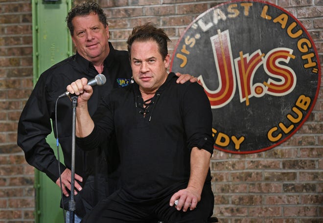 David “Junior” Litz, at left, owner of Jr.'s Last Laugh in Erie, has sold the comedy club to magician and Erie native Bobby Borgia. Borgia plans to add magicians to the lineup of comedians who will headline at the club. [CHRISTOPHER MILLETTE/ERIE TIMES-NEWS]