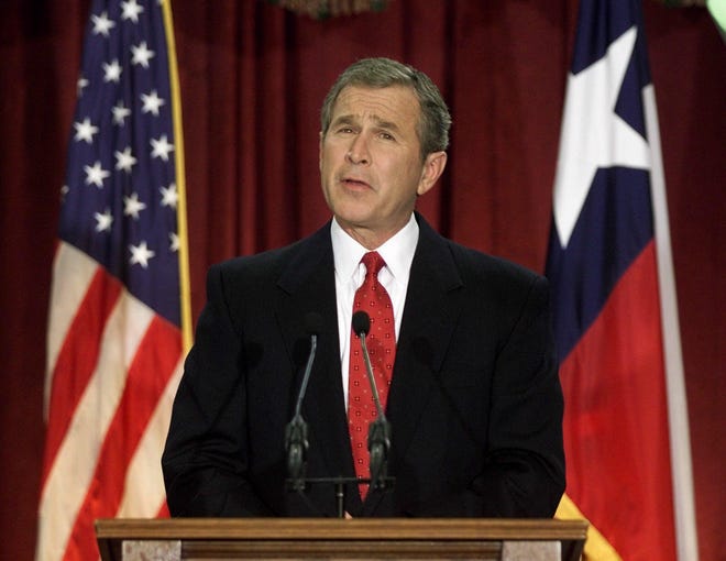 President-elect George W. Bush addresses the nation from the chambers of the Texas House of Representatives in Austin on Dec. 13, 2000. [J. Scott Applewhite/The Associated Press]