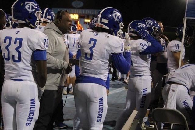 Tuscaloosa County High School assistant football coach DeAndre Little interacts with players during a football game. Little died unexpectedly on Nov. 20 because of complications from a recent stay in the hospital.