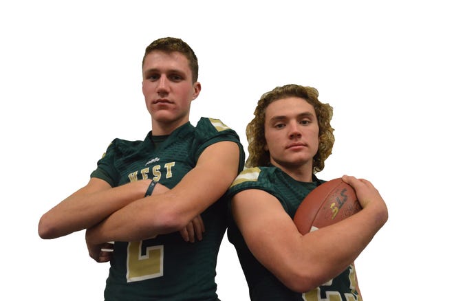 Zeeland West's Travis Vredeveld (left) and Chase Peddie are The Holland Sentinel Football Players of the Year. [Dan D'Addona/Sentinel staff]