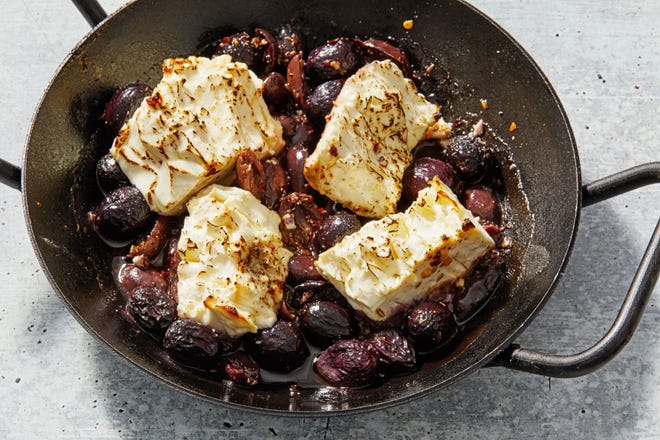 Roasted feta with grapes and olives [Tom McCorkle/For The Washington Post]