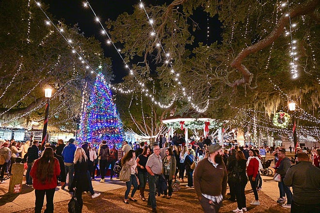 People gather on the Plaza de la Constitucion in St. Augustine during the city’s annual Nights of Light event on Saturday. Nights of Lights runs until Feb. 2, 2020. [PETER WILLOTT/THE RECORD]