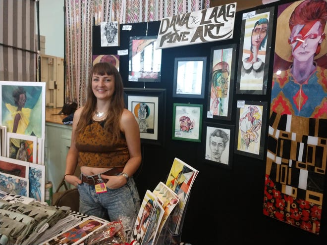 Dana Laag, a local artist, said that her art brand Dal Haus doesn’t always fit within the more conservative Sarasota arts scene, and so she has appreciated the unconventional nature of the Atomic Holiday Bazaar, where she has found a home for her art. [HERALD-TRIBUNE STAFF PHOTO / MICHAEL MOORE JR.]
