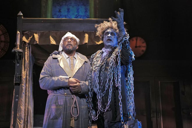 Roderick Sanford is as potent as ever as Marley, who visits Marc Pouhé as Scrooge in a scene during "A Christmas Carol" that could be out of a horror movie. [Contributed by Kirk Tuck/Zach Theatre]