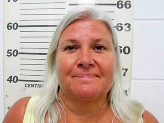 FILE - This file photo provided by the South Padre Island Police Department shows Lois Riess, of Blooming Prairie, Minn., who was arrested by federal deputy marshals Thursday, April 19, 2018, at a restaurant in South Padre Island, Texas. Riess pleaded guilty Tuesday, Dec. 17, 2019 to killing a Florida woman who prosecutors said was targeted because the two looked alike. Officials say Riess will serve a life sentence in prison for the first-degree murder of Pamela Hutchinson. (South Padre Island Police Department via AP)