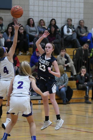 Allie Powers passes inside during Somerset Berkley's season-opening win over Mount Hope on Monday. [Photo | Rob Tierney]
