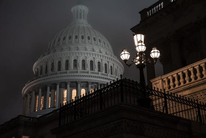 The House of Representatives passed spending legislation that would forestall a government shutdown this weekend. [J. Scott Applewhite/The Associated Press]