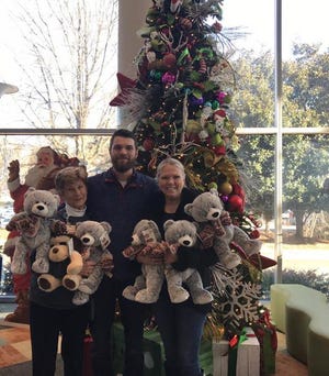 Nicholas accompanied by his mother Pamela delivering bears to Levine Children's hospital in Charlotte. [CONTRIBUTED PHOTO]