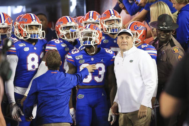 Florida coach Dan Mullen said the NFL isn’t something he’s really thought of. “I plan on being here for a long time,” Mullen said Monday. “I love being here.” [Matthew Stamey/Associated Press]