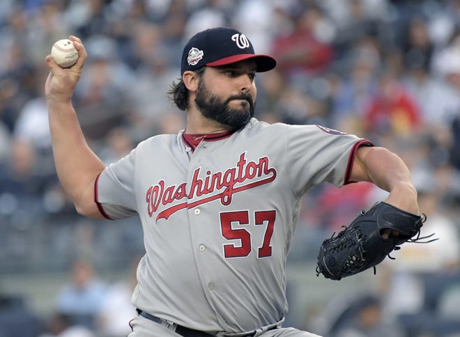Tanner Roark has agreed to a contract with the Toronto Blue Jays. [Bill Kostroun/The Associated Press]