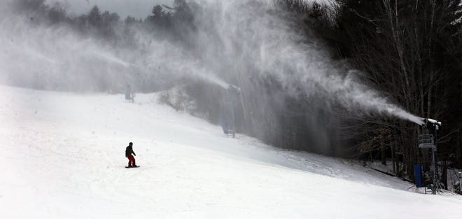 The snow guns have been working hard to keep Attitash covered this season. [File Photo/The Associated Press]