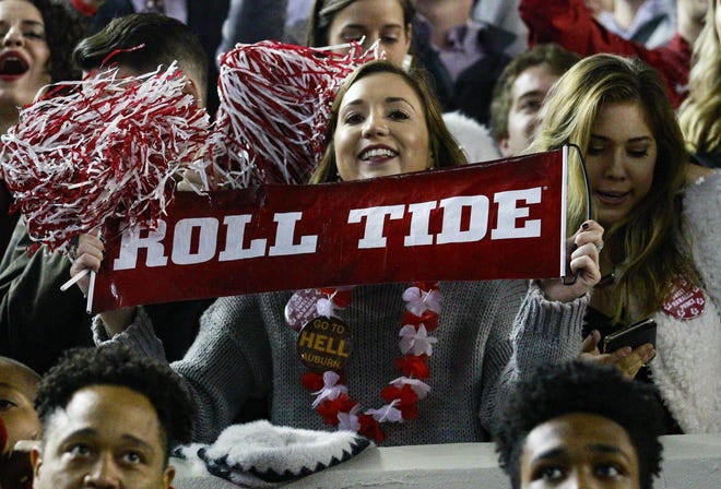 Alabama fans sing Dixieland Delight during the fourth quarter of an NCAA football game between the Alabama Crimson Tide and The Auburn Tiger at Bryant-Denny Stadium in Tuscaloosa, Ala. on Saturday, Nov. 24, 2018. [Photo/Jake Arthur]