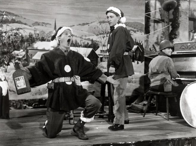 From left, Danny Kaye and Bing Crosby in “White Christmas” [FILE PHOTO]