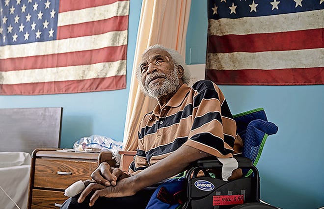 When Army veteran Eugene Milligan fell off a charity’s rolls for home-delivered Meals on Wheels because of a long stay in the hospital last winter, he had to rely on others such as his son, a local church and a generous off-duty nurse to bring him food. [Andrea Morales for Kaiser Health News]