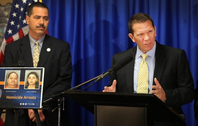 Lakeland Assistant Police Chief Mike Link, right, describes the death of 22-day-old Betsey Kee Stephens during a press conference in December 2014. The baby's mother and her husband were charged with starvation leading to death of the infant. At left is LPD Captain Victor White. [ERNST PETERS/THE LEDGER]