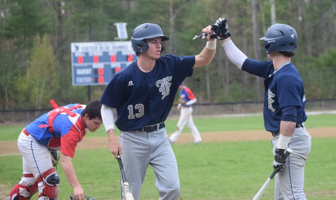 Exeter High School shortstop Brady Green, left, will continue his baseball career at Division 1 Northeastern University next year. [Mike Zhe/Seacoastonline files]