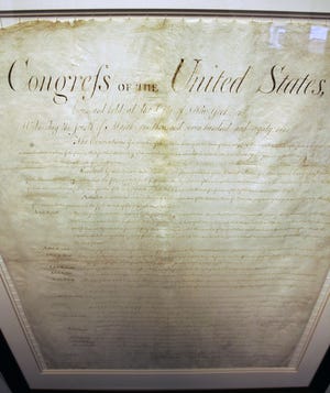 New Jersey's original manuscript Bill of Rights is seen on display. New Jersey was the first state to ratify the Bill of Rights, which became the first 10 amendments to the U.S. Constitution. [AP Photo/Mel Evans, File]