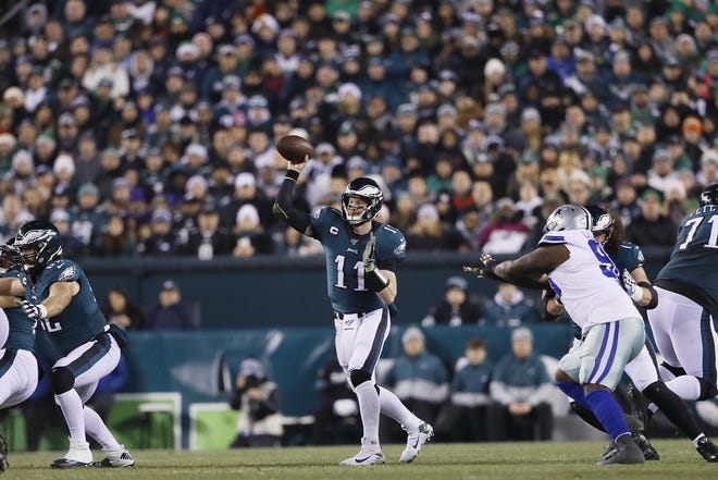 Philadelphia Eagles quarterback Carson Wentz completed 31 of his 40 pass attempts and threw for 319 yards and a touchdown. [Michael Perez / Associated Press]