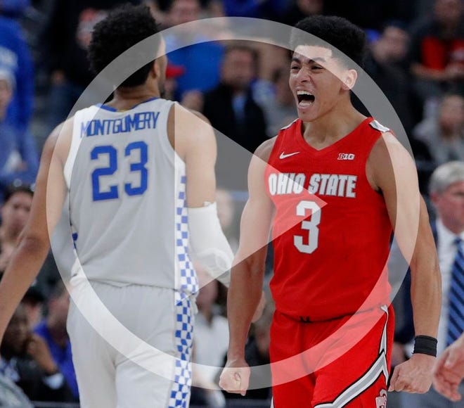 In this file photo Ohio State's D.J. Carton (3) celebrates after a play against Kentucky during the second half of an NCAA college basketball game Saturday, Dec. 21, 2019, in Las Vegas.