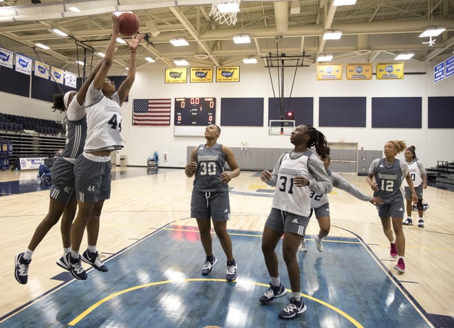 Gulf Coast’s D’Asia Gregg (44) goes up for a layup during a practice on Oct. 29. [JOSHUA BOUCHER/THE NEWS HERALD]