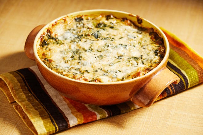 Warm crab and spinach dip [Tom McCorkle/For The Washington Post]