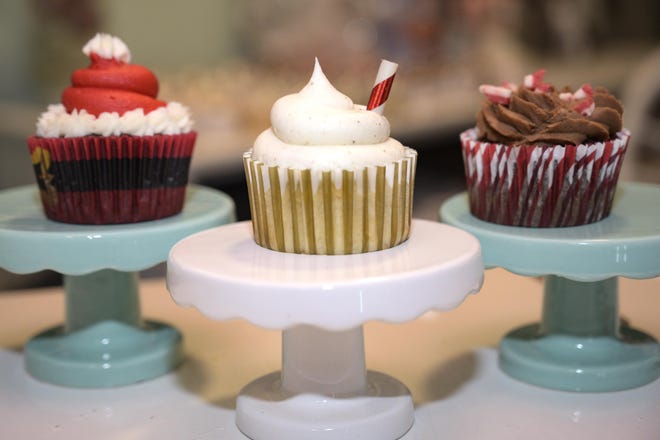 Holiday favorites at Cassie’s Cupcakes in Mount Dora include Santa’s red velvet, eggnog and gluten-free chocolate peppermint. [Cindy Sharp/Correspondent]