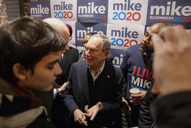 Mike Bloomberg, Democratic Candidate, walks into the crowd of supporters and volunteers to speak to them and take photos after speaking on Saturday, Dec. 21, 2019. "We have to find a way to get people to believe that they have a future that the kids are going to do better and pull people together," Bloomberg said. "Donald Trump is trying to divide everybody and make everybody worse." TYGER WILLIAMS / The Philadelphia Inquirer