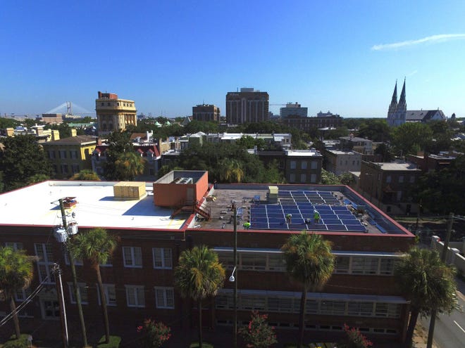 Rooftop solar such as these panels on the United Way building on Monterey Square will soon be earning a better payback from Georgia Power. [Photo courtesy Hannah Solar.]