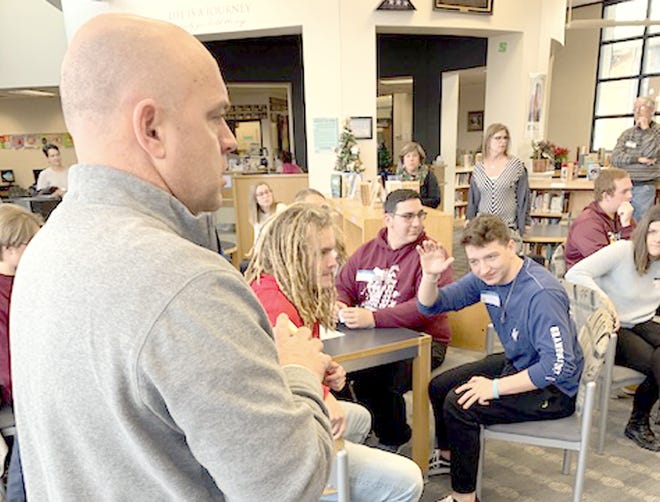 Centreville High School Principal Chad Brady met with more than two dozen former students after the district’s inaugural “Alumni Day.” [Jef Rietsma/Journal]