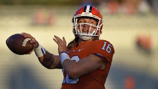 Clemson quarterback Trevor Lawrence has bought into the no-respect mantra being pushed by his head coach, Dabo Swinney. [Richard Shiro/The Associated Press]