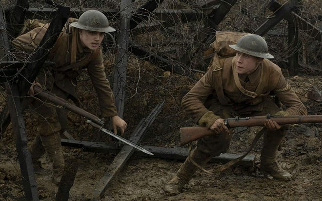 Dean-Charles Chapman and George MacKay in 1917 (Francois Duhamel / Universal Pictures and DreamWorks Pictures/TNS)