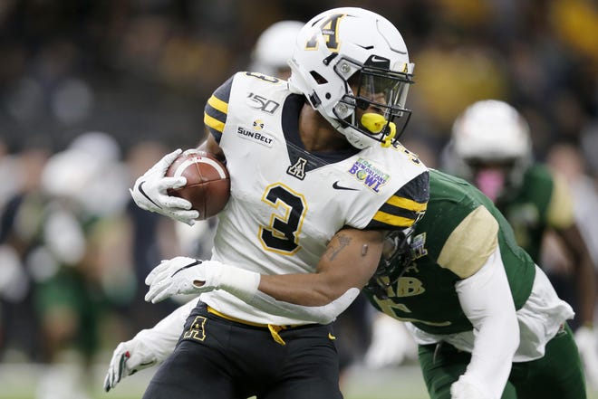 New Smyrna Beach product Darrynton Evans took MVP honors of the 2019 New Orleans Bowl, rushing for 157 yards and scoring a touchdown in Appalachian State’s 31-17 win over UAB. (AP Photo/Brett Duke)