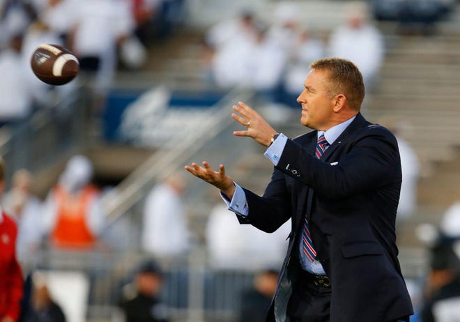 Kirk Herbstreit plays catch before a game between Penn State and Ohio State in 2018 at Beaver Stadium in State College, Pa. [Justin K. Aller/Getty Images/TNS]