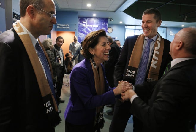 Gov. Gina Raimondo shares a laugh at a recent event to announce a new development project in Pawtucket. [The Providence Journal / Bob Breidenbach]