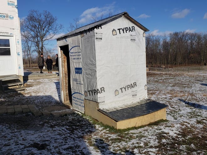 An outhouse is pictured on the property of 9253 Ranger Highway, Morenci. The Lenawee County Health Department has filed lawsuits against 14 Amish families due to inadequate water and sewer systems. In court documents, the health department contends the Amish are in violation of county health code. The Amish do not have indoor plumbing and use versions of outhouses. At this residence, waste is thrown in with livestock manure.