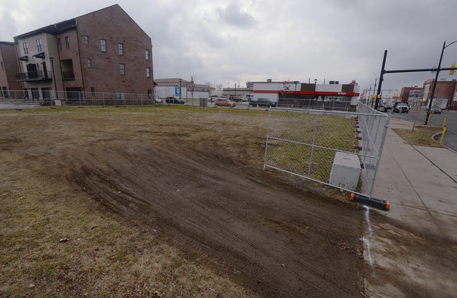 Zaphiris Family LP has secured a building permit to build a new bank building on this vacant lot in Erie, near West 12th and Peach streets, for Citizens Bank. [GREG WOHLFORD/ERIE TIMES-NEWS]