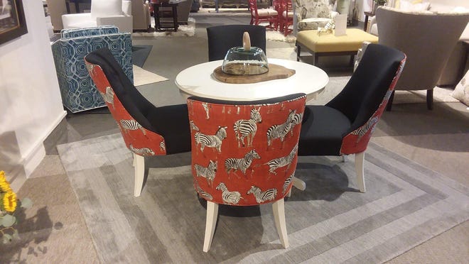 Popular upholstery fabrics include animals in home decor showrooms. [CONTRIBUTED PHOTO/DECORATING DEN]