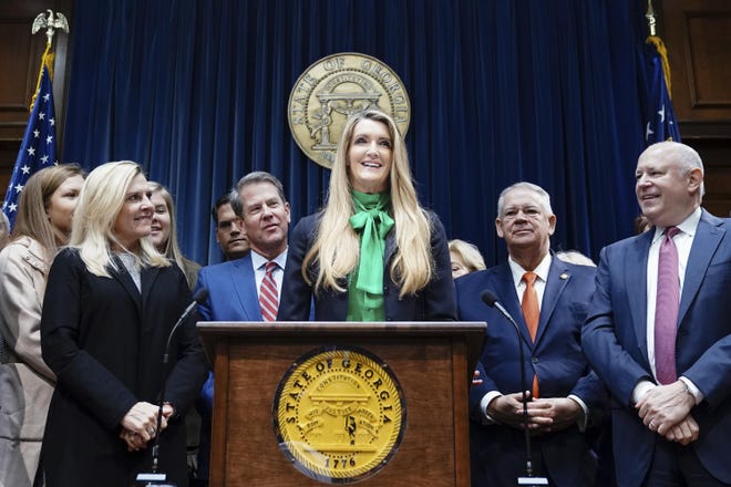 Businesswoman Kelly Loeffler speaks after being introduced by Governor Brian Kemp as his pick to fill Georgia’s vacant U.S. Senate seat at the Georgia State Capitol on Wednesday, Dec. 4, 2019, in Atlanta, Ga. (AP Photo/Elijah Nouvelage)