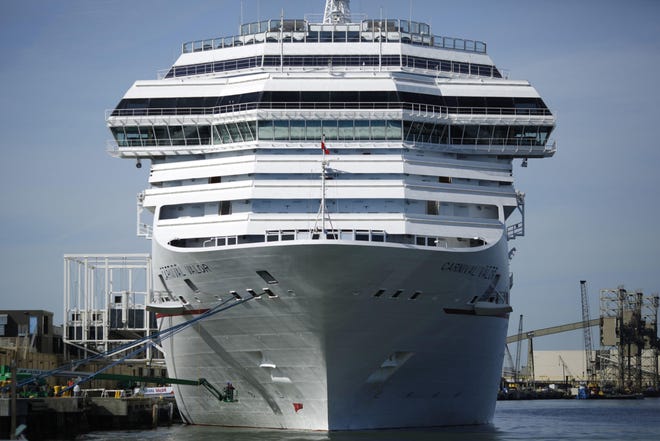 The Carnival Corp. cruise ship Carnival Valor is pictured sits docked at the Port of Galveston in 2017. [Luke Sharrett/Bloomberg]