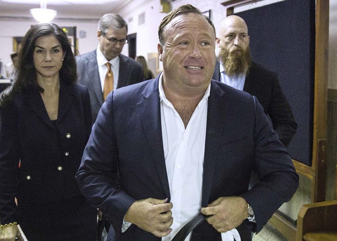 “InfoWars" host Alex Jones arrives at the Travis County Courthouse in April 2017. [Tamir Kalifa/American-Statesman]