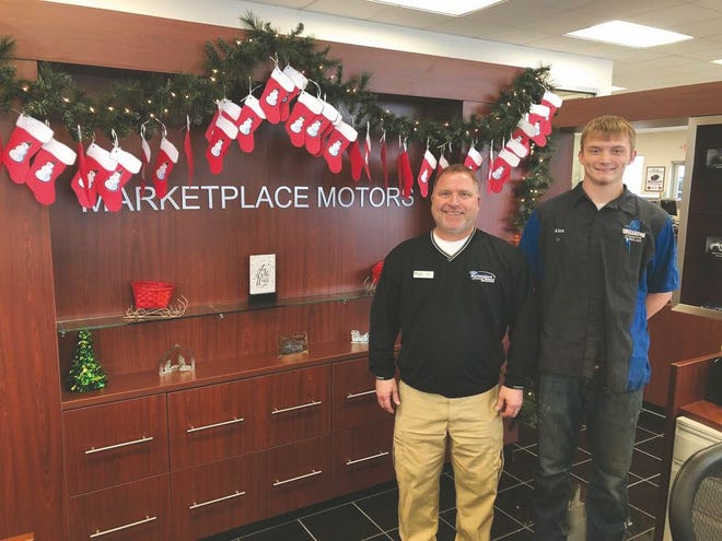 Alex with his supervisor from Marketplace Ford, Chris Devier.